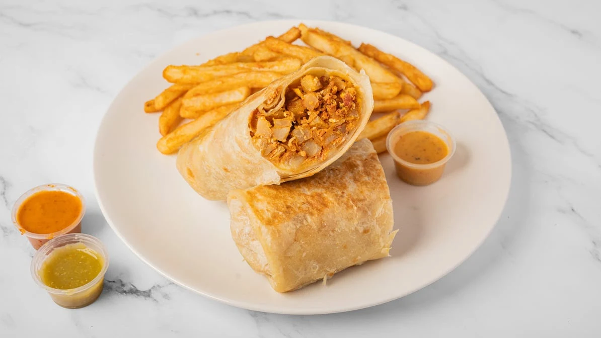 A burrito plated at Sazónova Taqueria in Chandler
