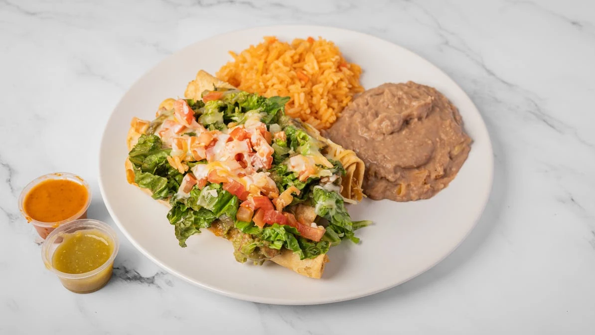 A fresh Sazónova plate served with rice and beans